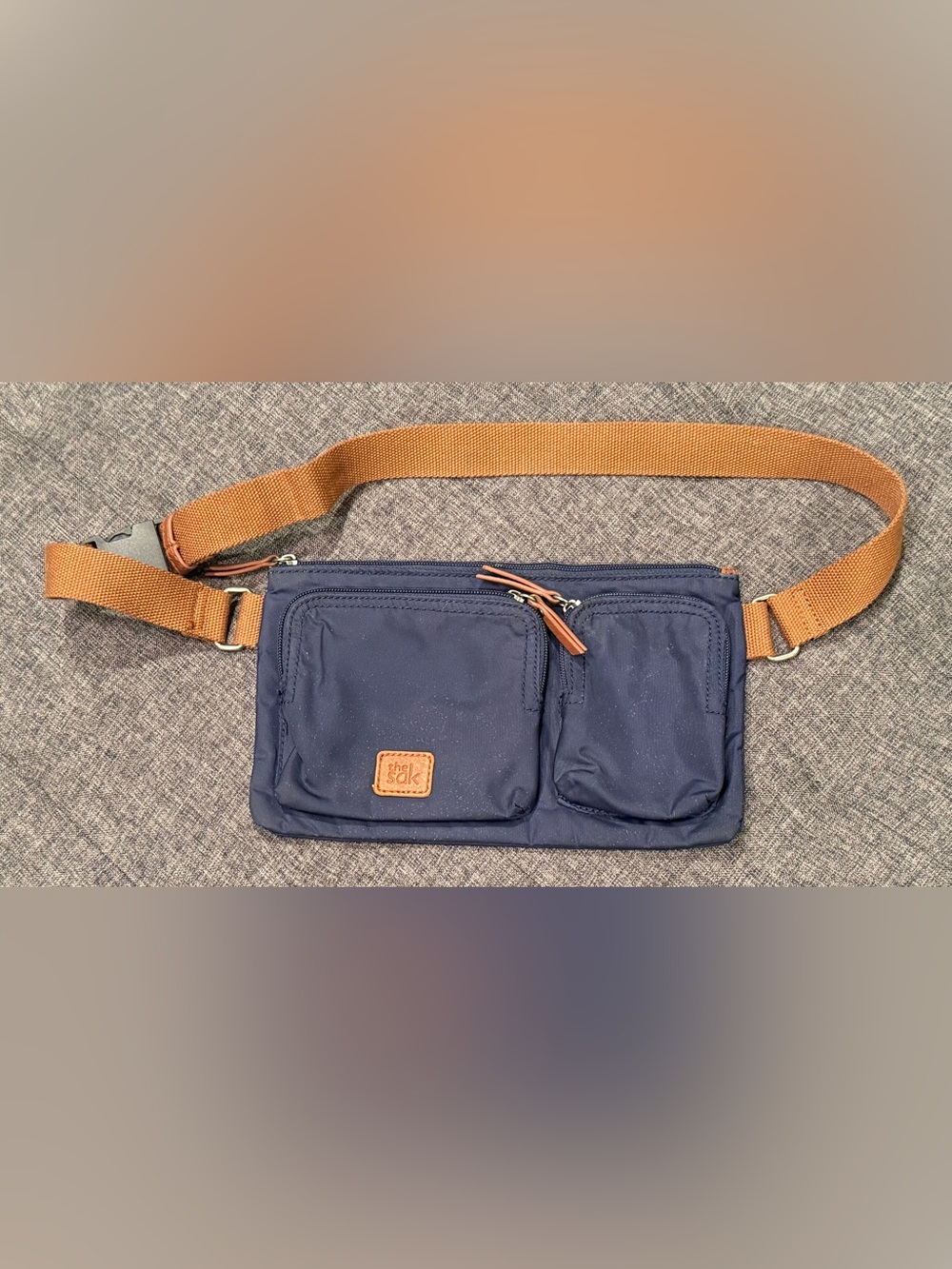 THE SAK Navy Crossbody Belt Bag with Tan Strap & Several Compartments